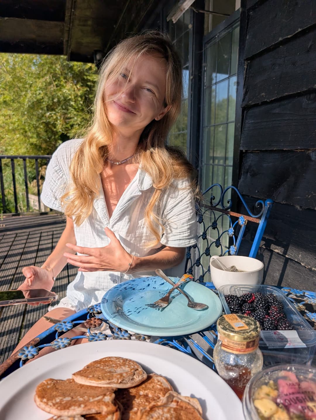 Portrait of the artist at the blue table